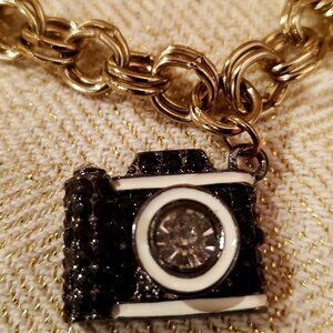 Capture her heart with the Betsey Johnson “Selfie Time” Camera Charm Bracelet. F